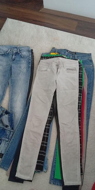 Haljine: Lot ženske odeće – pantalone/farmerke i crne koktel haljine Sadržaj — 12