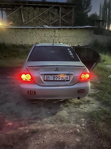 skoda rapid 2012: Mitsubishi Lancer: 2006 г., 1.6 л, Механика, Бензин, Седан — 3