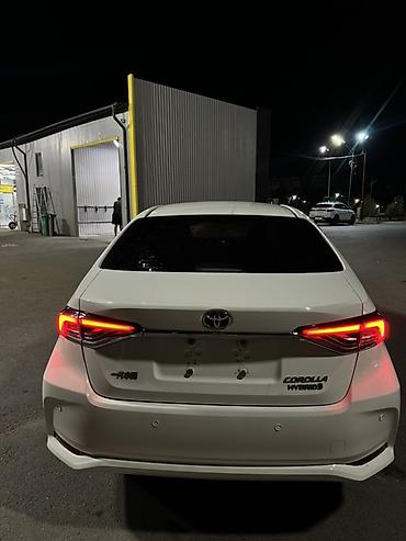 byd e1: Toyota Corolla: 2022 г., 1.8 л, Автомат, Гибрид, Седан — 5
