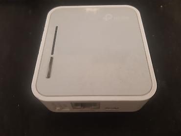 mini wifi router: TP-Link daşınan Wi‑Fi router (travel router) Xüsusiyyətlər: - Kompakt — 2