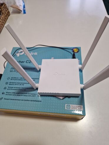 wi fi роутеры модемы: Продаю Tp-link Archer C24 AC 750 Двухдиапазонный Wi Fi роутер в