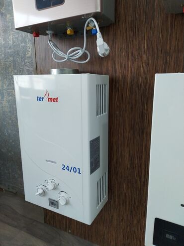 радиатор комби: Termet 24/01 qaz su qızdırıcısı. Ağ rəngdə, yığcam dizaynlıdır və