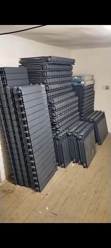 Radiyator ağir seksiyali bir seksiyasi 9 aze karçnivi də var hər