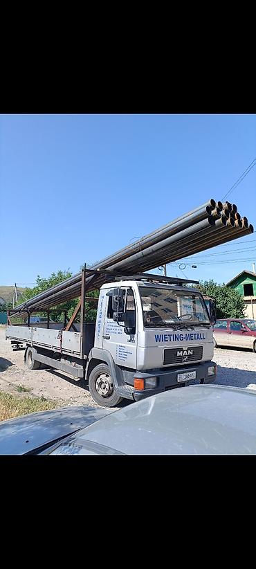 седло на ман: Услуги по перевозке длинномерных грузов на бортовом грузовике MAN. - — 1
