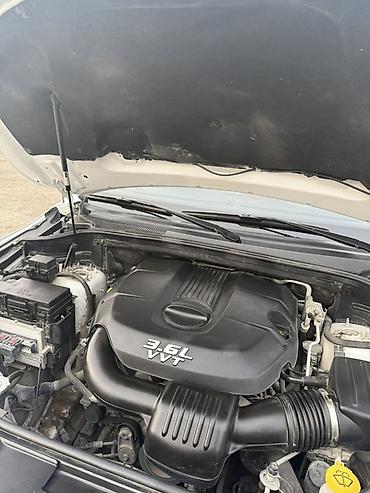 Dodge: Dodge Durango – ağ rəngli, 7 yerlik geniş SUV. Mühərrik və — 9