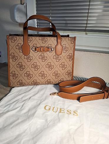 longchamp torba cena: Prodajem original novu GUESS torbu u bež/smeđoj kombinaciji sa — 1