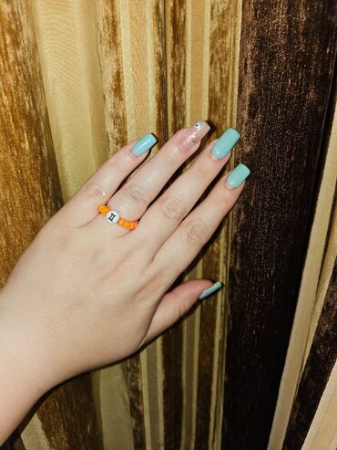 Üzüklər: Muncuqlu üzükler bürclerle cütü 1 manat,sadesi 0,50 qepik.her rengi — 2