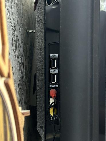 комтер: Телевизор Skyworth, диагональ около 32" (ориентировочно). Плоская — 3