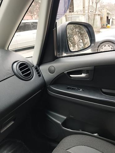 suzuki moto: Suzuki SX4 – gümüşü rəngli, şəhər və rayon yolları üçün praktik — 8