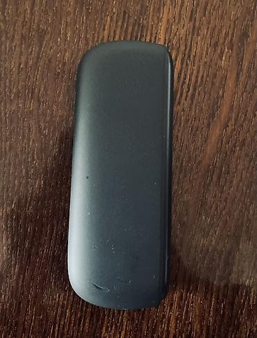 qara halile: IQOS elektron tütün qızdırıcısı, qara rəngdə, kompakt və zərif dizayna — 7