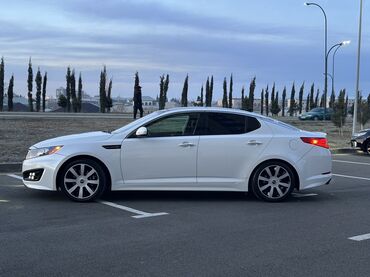 Kia: Kia Optima – ağ rəngli, zərif sedan Xarici xüsusiyyətlər: - Aqressiv — 10