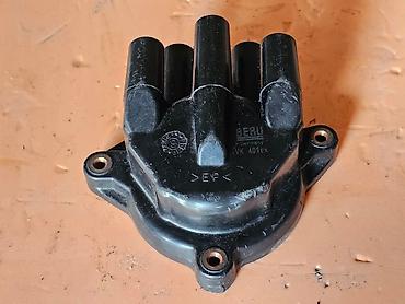 Другие детали для мотора: Крышка трамблера Opel Vectra A, Omega A, Astra F, Kadett E, 1.8 - 2.0 — 6