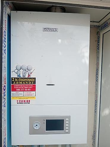 Qaz kombi sistemi və radiatorlar - Divara quraşdırılan qaz kombisi