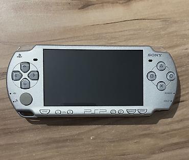 memory kart: Sony PSP portativ oyun konsolu – gümüş rəng Xüsusiyyətlər: - Model — 1