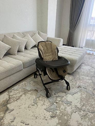 4 mom: Японская компания Combi разработала уникальную электронную люльку- — 2