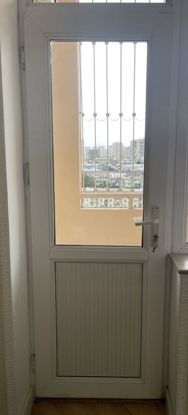 Subaru: PVC balkon qapısı - Material: ağ rəngli PVC profil - Dizayn: yuxarı