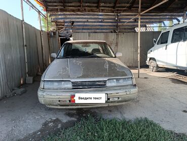 tayota runx: Mazda 626: 1989 г., 2.2 л, Механика, Бензин, Седан