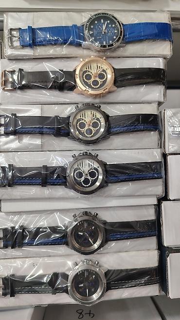 meta eynək: Müxtəlif dizaynlarda kişi qol saatları kolleksiyası Rolex, Rolex saat — 1