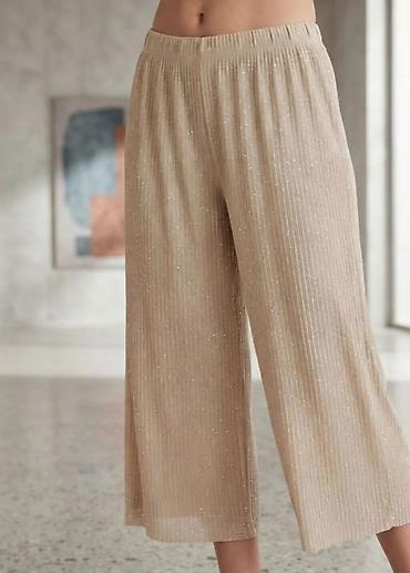 Ženske pantalone culotte kroja u bež/nude nijansi sa diskretnim