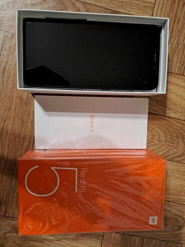 смартфон philips s307: Xiaomi, Redmi 5, 16 ГБ, цвет - Черный