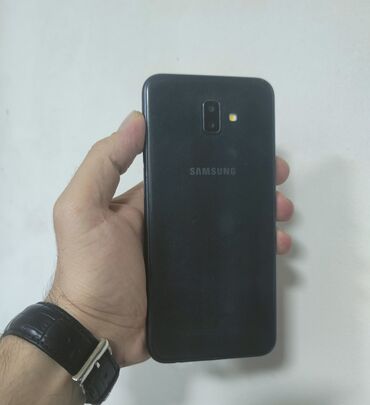 Qulaqlıqlar: Samsung Galaxy J6 Plus, 32 GB, rəng - Qara, Barmaq izi, İki sim kartlı
