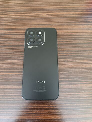ustroistvo telefona flai: Honor X8, 256 ГБ, цвет - Черный, Гарантия, Сенсорный, Отпечаток пальца
