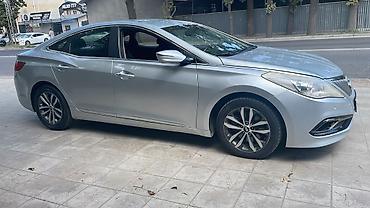 byd e6: Hyundai Grandeur: 2011 г., 0.3 л, Автомат, Газ, Седан — 3