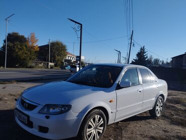 какие машины входят в комфорт яндекс такси в бишкеке: Mazda Familia: 2001 г., 1.5 л, Автомат, Бензин, Седан