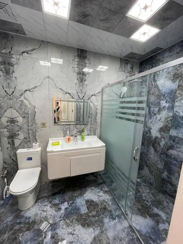 Uzunmüddətli kirayə mənzillər: Yasamalda Grand həyətdə 27 mertebeli binanın 8-ci mərtəbəsində — 9