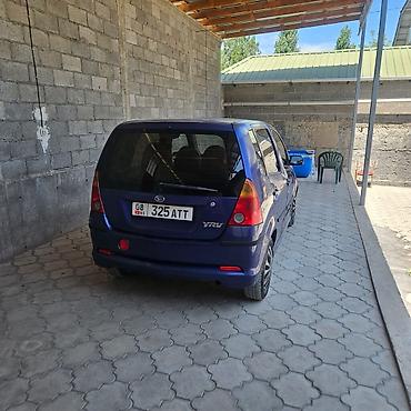 нур мото: Daihatsu YRV: 2002 г., 1.3 л, Механика, Бензин — 2