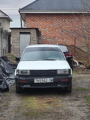 byd e1: Nissan Bluebird: 1988 г., 2 л, Механика, Универсал — 7