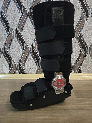 diz karseti: Tənzimlənən dizaynlı topuq-baldır ortozu (ankle-foot walker) - Model — 5