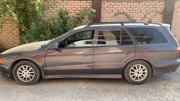 граната на мазда демио: Mitsubishi Galant: 1998 г., 2 л, Механика, Бензин, Универсал