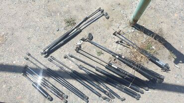 на мазда 323f: Торсионы или аморты оригинал багажника и капота на разные авто