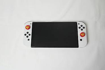 Nintendo Switch: U ponudi je Nintendo Switch OLED (čipovan). Memorija: 256 GB + 64 GB — 11
