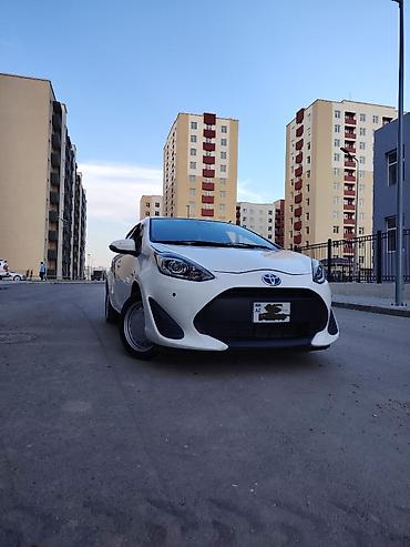 Транспорт: Toyota Aqua: 1.5 л | Хэтчбэк — 7