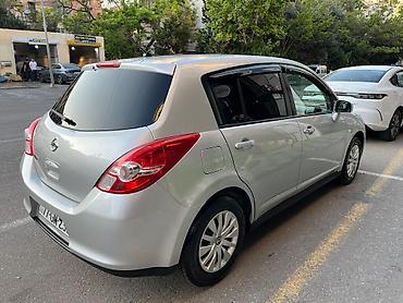 bort baqaj: Nissan Tiida hatchback – gümüşü rəng Xüsusiyyətlər və təchizat: - — 2