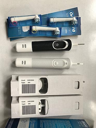 Электрическая зубная щётка Oral-B Vitality (Braun) с насадками 2500