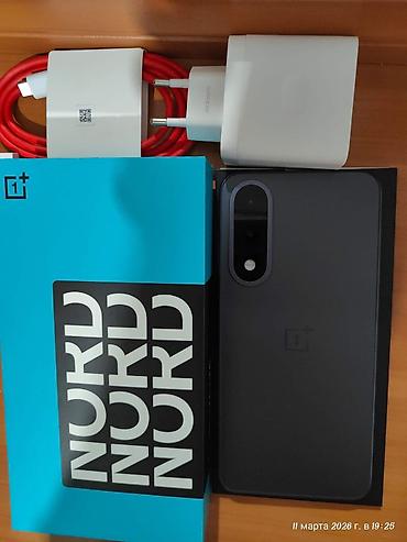 Смартфон OnePlus Nord 5 (линейка OnePlus, цвет темно‑серый). Ключевые — 3