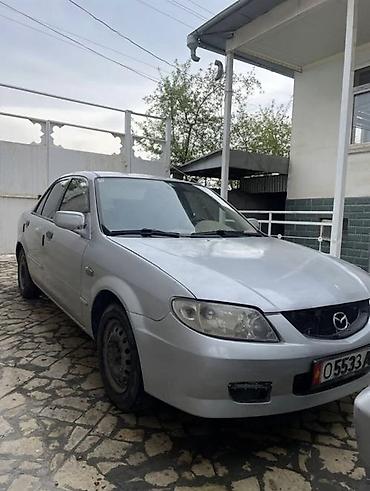 аренда mazda 323: Mazda 323: 2003 г., 1.4 л, Механика, Бензин, Седан — 2