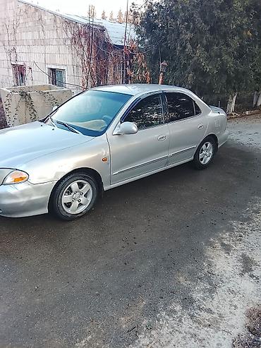 Mazda: Mazda 323: 1999 г., Механика, Бензин, Седан — 4
