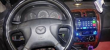 Mazda Capella: 1998 г., 1.8 л, Механика, Газ, Седан