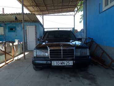 maşın şəkilləri çəkmək: Mercedes-Benz E 220: 2.2 l | 1994 il Sedan