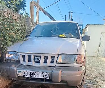 sportage: Kia Sportage 4WD, benzin, avtomat ötürmə. Ağ/göyərti rəng çaları ilə — 2