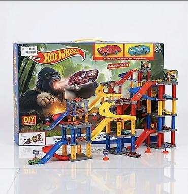 wheels: Игровой набор Hot Wheels «Многоуровневая парковка с трассами» - — 1
