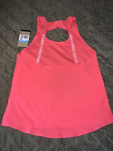 aksa: Nike Pro Women's Dri-FIT Tank Top vel. XS, M 
Recycled Materials
IB — 6