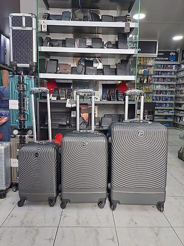 Çamadanlar: Sərnişin çamadan dəsti – 3 ölçü - Material: sərt korpus (yüngül və — 1