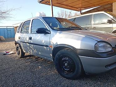 Opel: Opel Corsa B, 5 qapılı hetçbek - Kuzov: kompakt hetçbek, gümüşü rəng — 4
