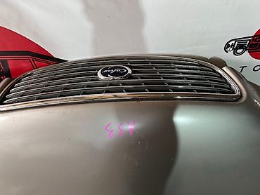 Решетка радиатора Nissan 2000 г., Б/у, Оригинал