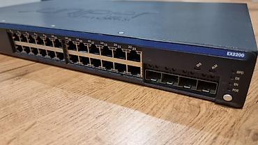 prosessor satilir: Juniper EX2200-24T-4G | 24 managed port + 4 SFP uplink Peşəkar — 2